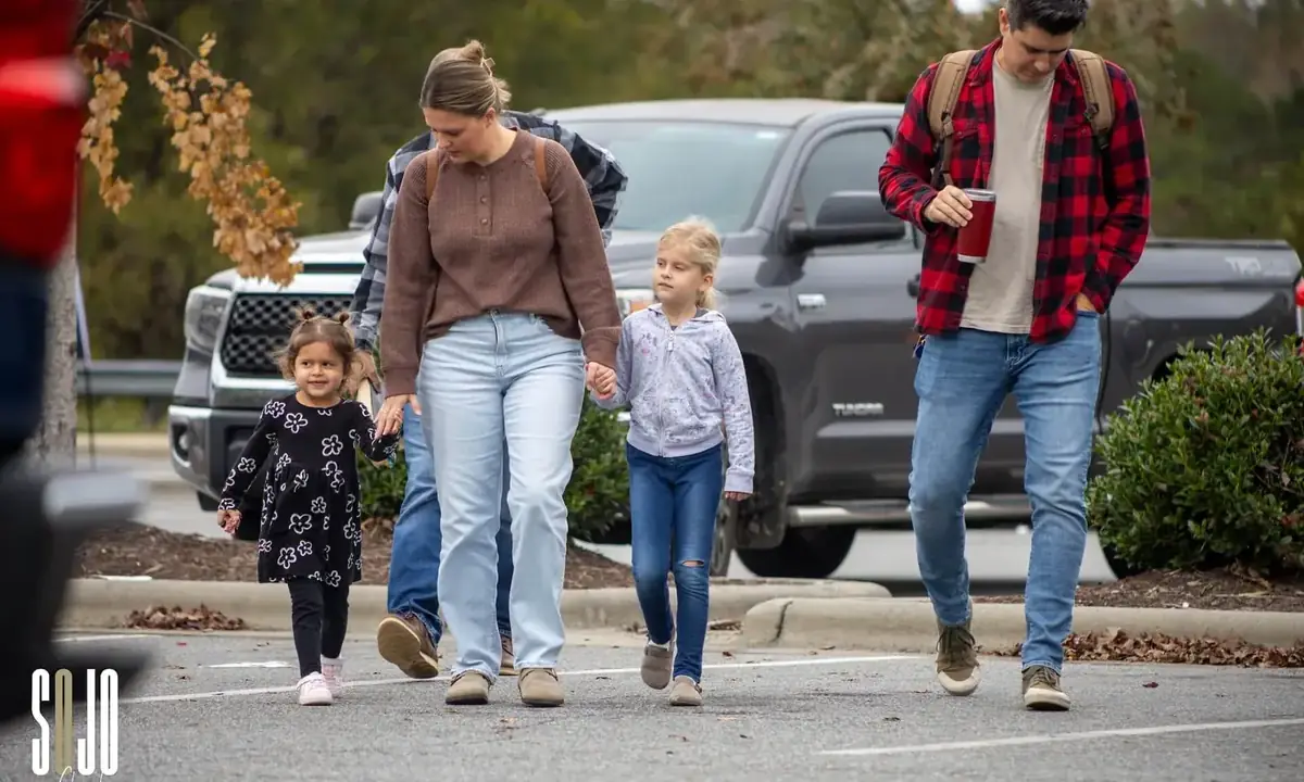 A family arriving at SOJO Church
