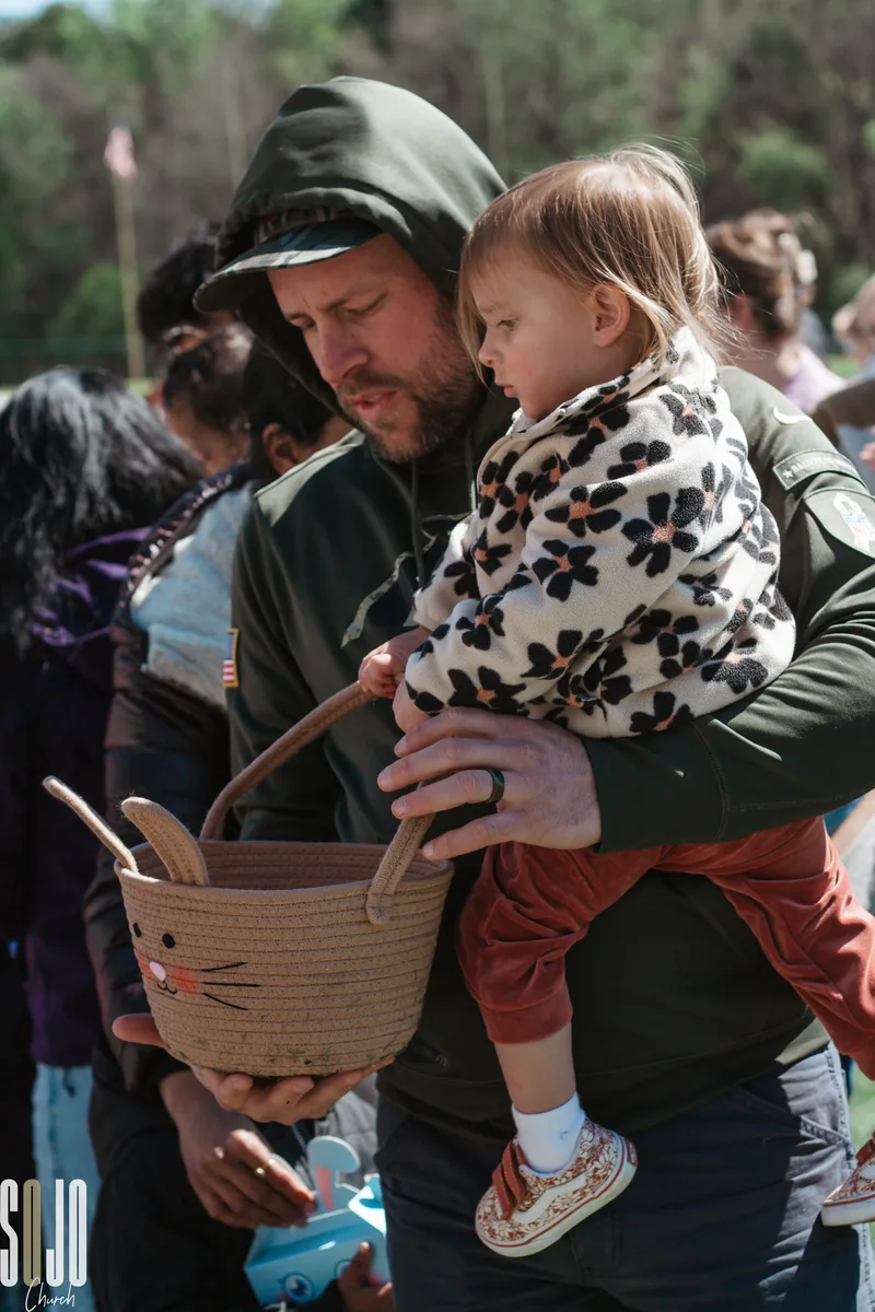 A dad and his daughter at the SOJO egg hunt