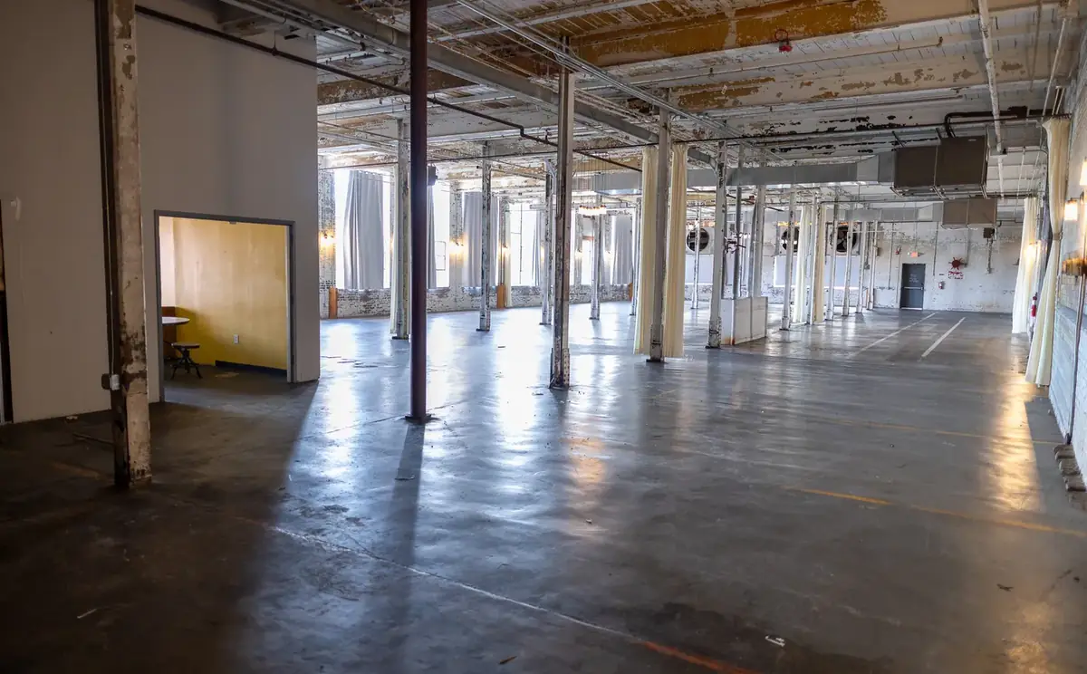 Looking through a doorway into the main mill floor