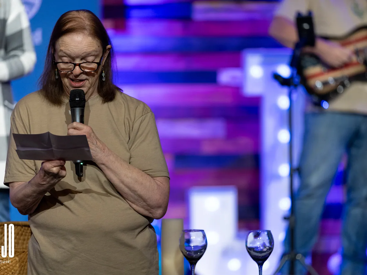 A SOJO member sharing her story before being baptized