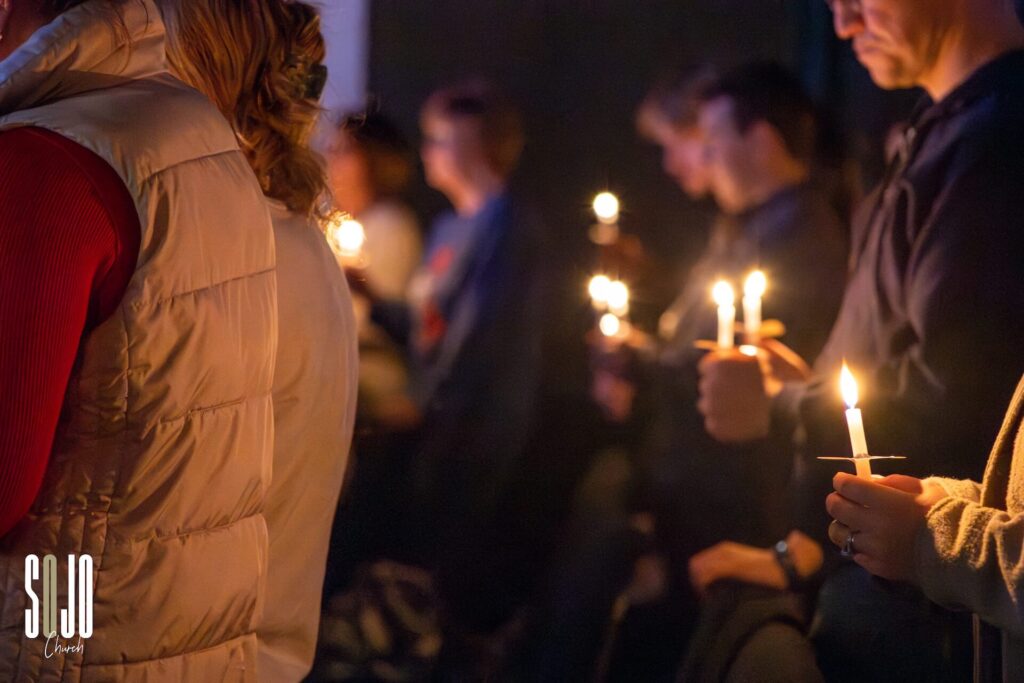 People holding candlelight at a vigil